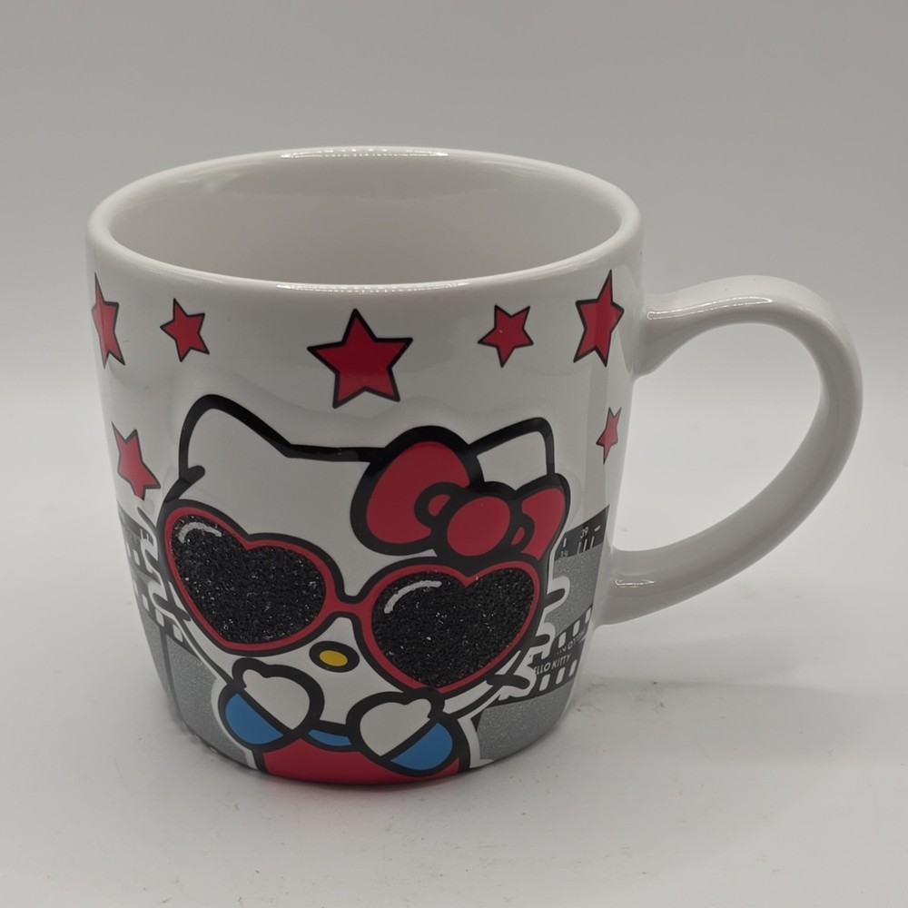 Universal Studios HELLO KITTY Star Struck Coffee Mug 2017 Embossed