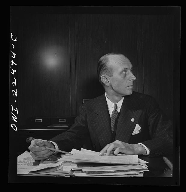 Photo:Portrait Man at Desk Office 1935 1940s Suit Papers Pen