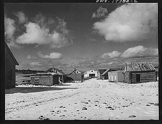 Photo:Penasco New Mexico Llano Largo 1930s Snowy Village Log Cabins