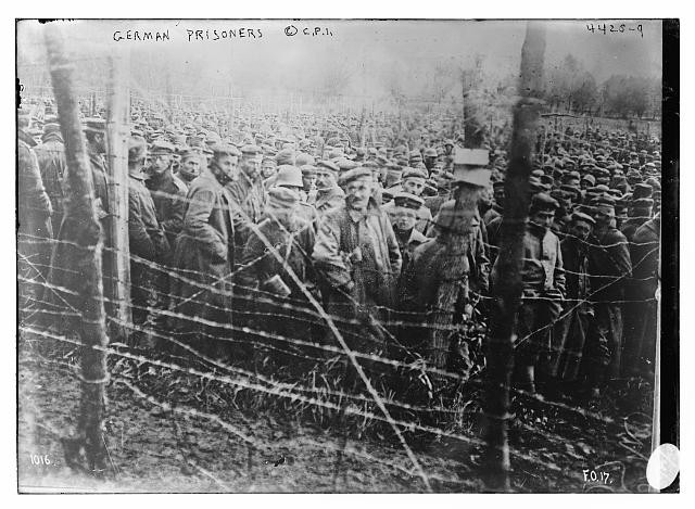 Photo:German prisoners,men behind barbed wire,Bain News Service