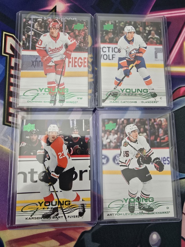 2025-26 Upper Deck Series One Hockey Holiday Young Guns Four Cards Lot