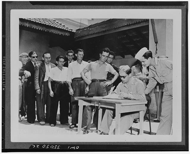 Photo:Puerto Rico 1940s Men Registering at Table Military Scene