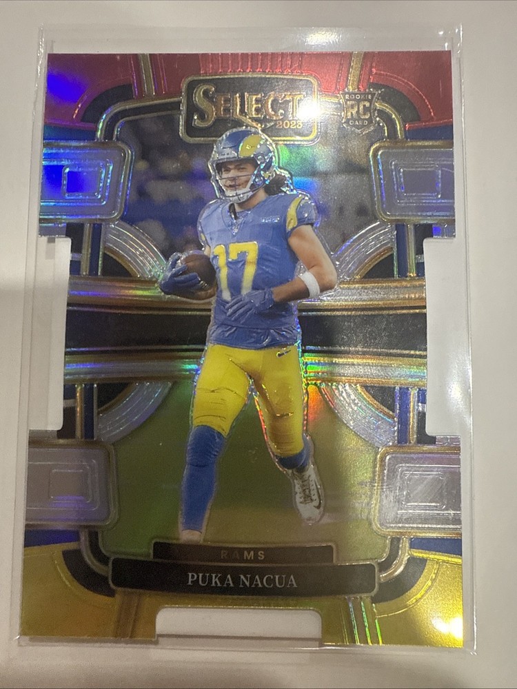 2023 Panini Select - Concourse Puka Nacua #56 Red & Yellow Prizm Die-Cut (RC)