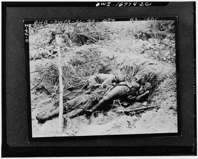 Photo:World War II Soldiers in Foxhole 1940s Battlefield Photograph