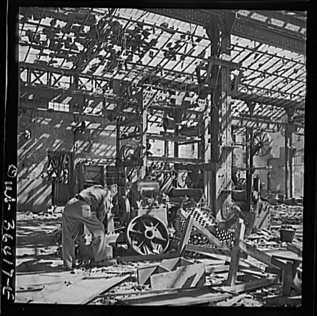 Photo:Industrial Ruins Factory Interior 1900s Machinery Worker