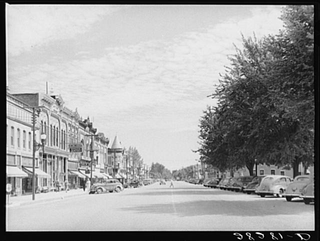 Photo:Grundy Center Iowa 1939 Main Street Downtown Storefronts Cars FSA