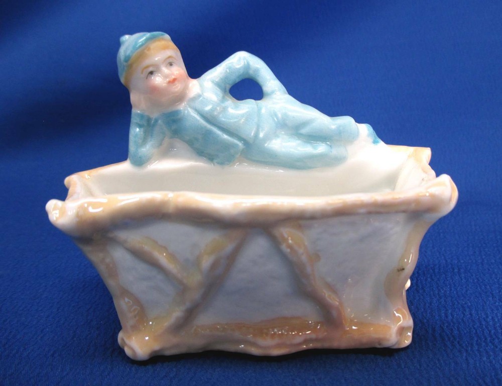 ANTIQUE FIGURAL STAFFORDSHIRE YOUNG LAD RESTING  MATCH BOX STRIKER  VESTA