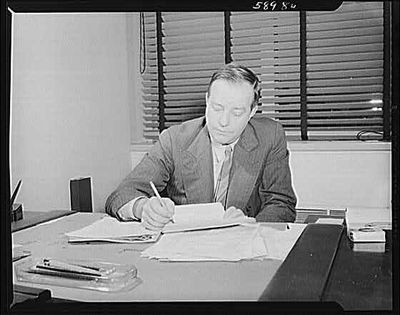 Photo:1940s Man at Desk Office Portrait Black and White Photograph