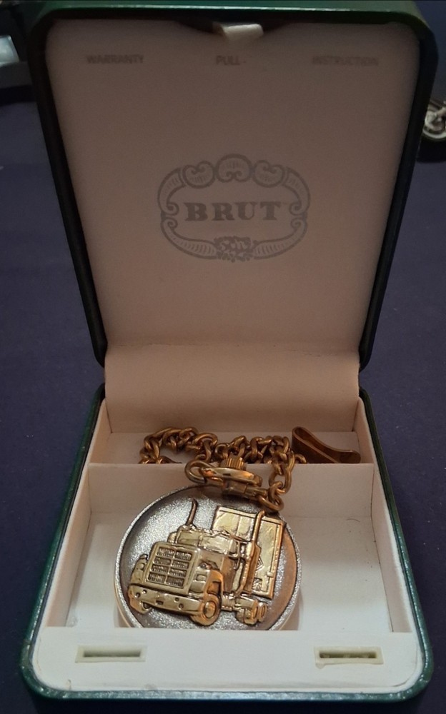 VINTAGE BRUT POCKET WATCH FEATURING A SEMI TRUCK AND TRAILER ON GOLD CHAIN