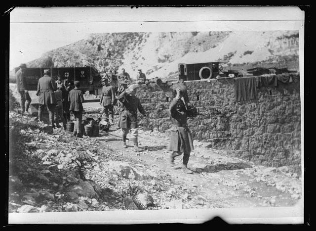 Photo:Montenegro 1920 American Red Cross Truck Porters Crossing Mountain