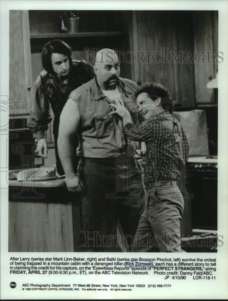 1990 Press Photo Rick Zumwalt flanked by TV's 