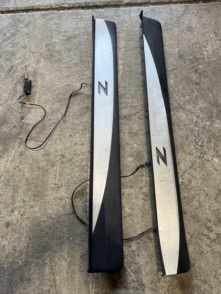 09-20  NISSAN 370Z Z34 LH RH SIDE DOOR STEP SCUFF TRIM USED OEM