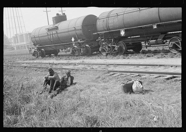Photo:Railroad Tank Cars Men Sitting Trackside 1930s Freight Yard
