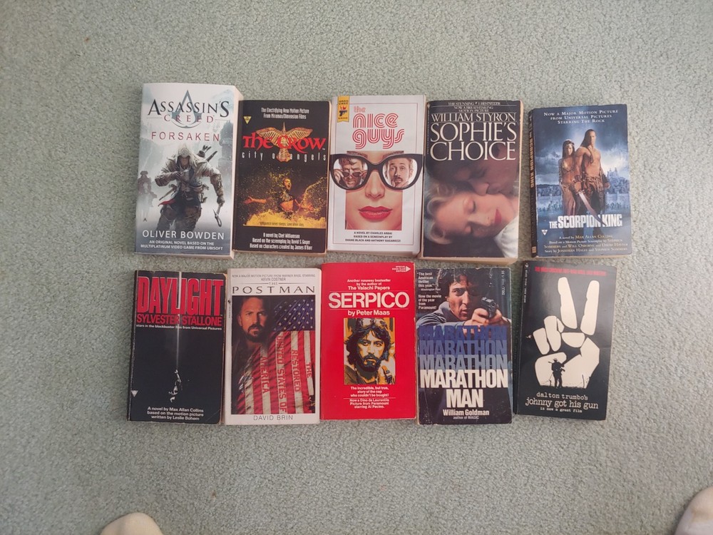 10 used novelizations / movie tie-ins paperbacks - Postman, Scorpion King,