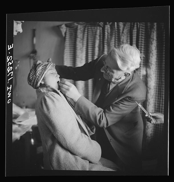 Penasco New Mexico Doctor Onstine Examining Child 1943 Taos County Clinic