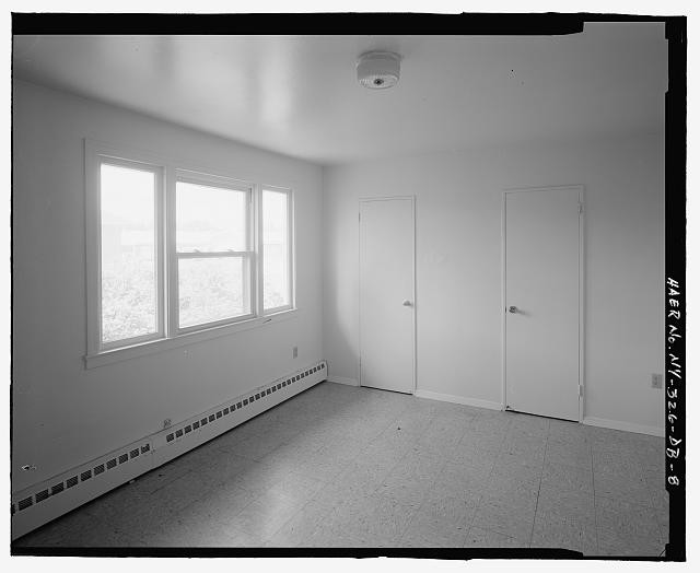 INTERIOR OF SECOND FLOOR BEDROOM IN UNIT C. view TO SOUTH. - Plattsburgh Air