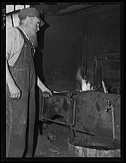 Blacksmith at the House of David religious community. Benton Harbor, Michigan