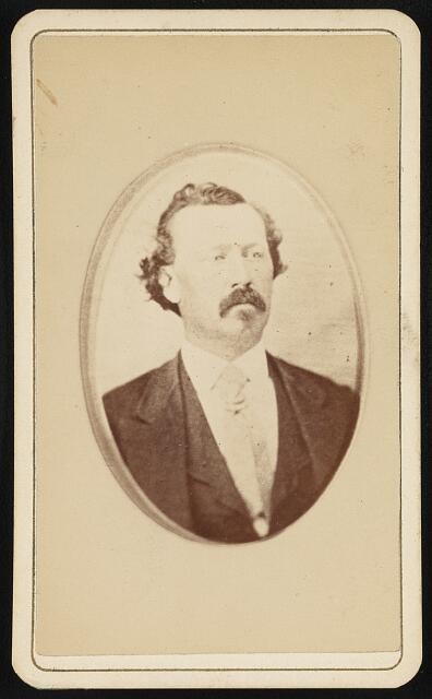 Photo:John Andrews, head-and-shoulders portrait, facing slightly right