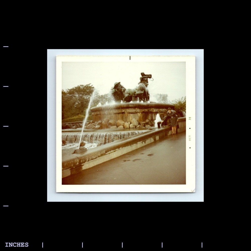 Square Color Photo WOMAN STANDING BY WATER FOUNTAIN 1970