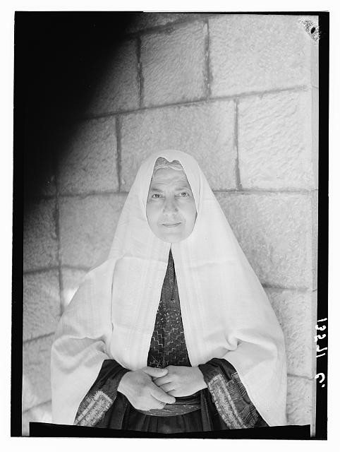 Photo:Portrait of Woman in White Veil 1947 Mosque Stone Wall