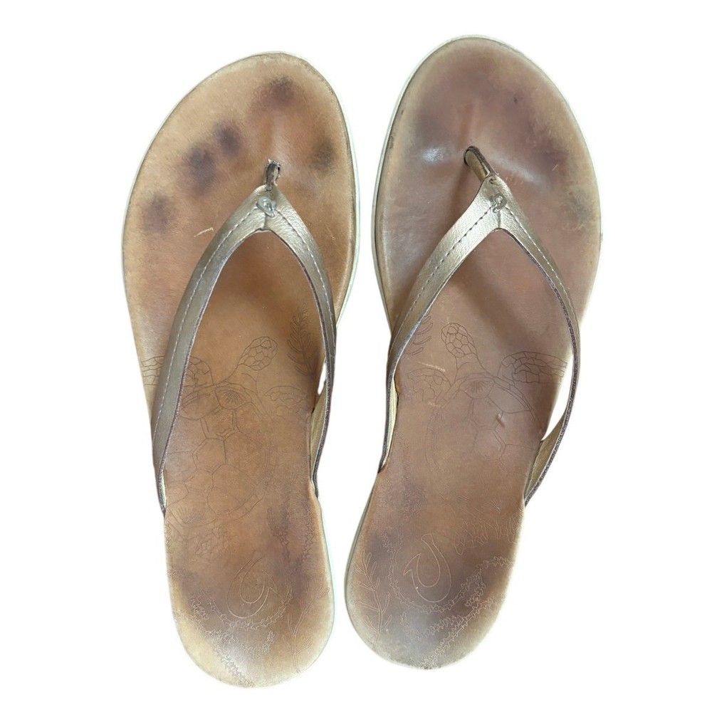 OluKai Womens Size 10 Brown Leather Sandals with Gold Straps and Comfort Footbed