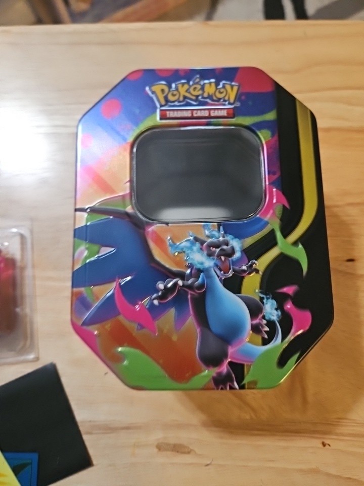 Pokémon TCG Evolutions Mega Charizard X Tin Case  Metal