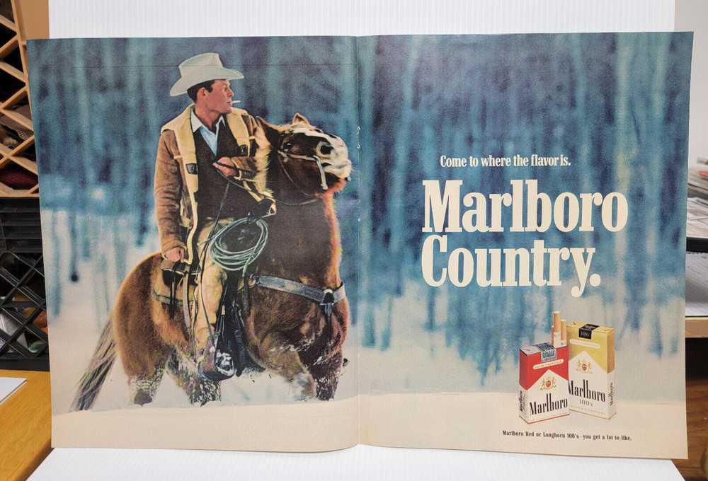 Vintage Marlboro Cowboy on horseback in snow 1971 print Ad 22 x 14