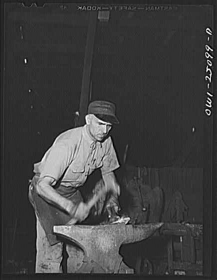 Photo:San Augustine Texas 1900s Blacksmith at Anvil Working Portrait