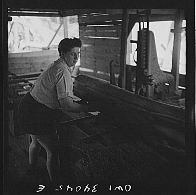 Photo:Woman Operating Weaving Loom Textile Mill 1940s