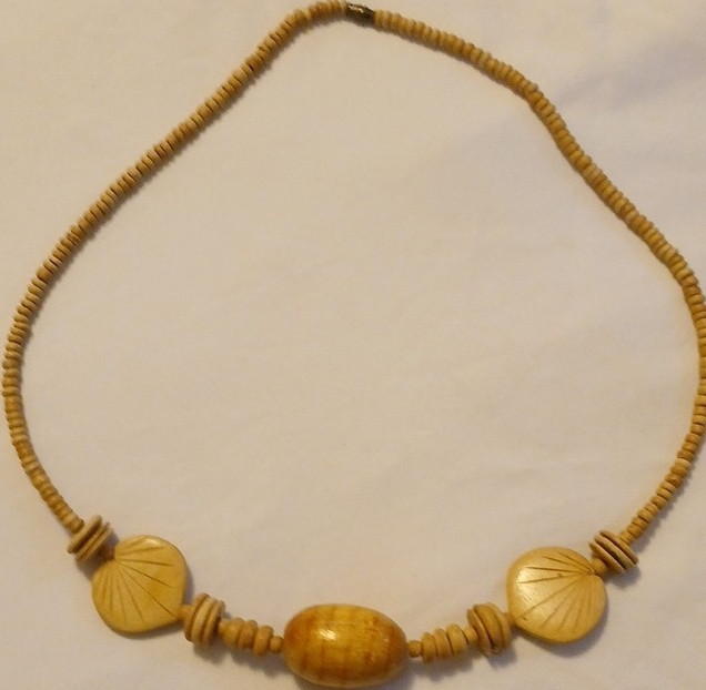 Handcrafted Wooden Beaded Necklace with Carved Accents, Barrel Closure, Beige