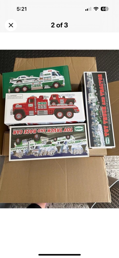 2 Large Boxes With 21 Unopened Hess Trucks