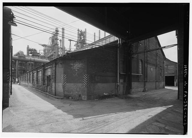 2. North and west facades of Crucible Steel Building; looking southeast -