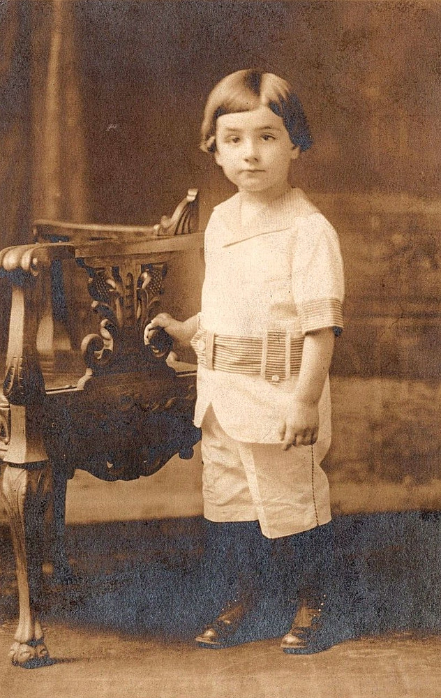 Portrait Of A Young Little Boy With A Chair Antique Vintage Real Photo Postcard