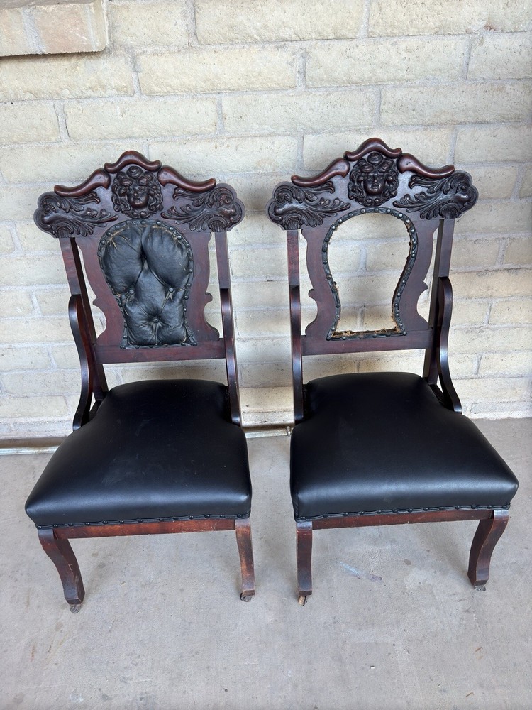 Antique Pair Of Renaissance Revival Chairs With Carved Faces