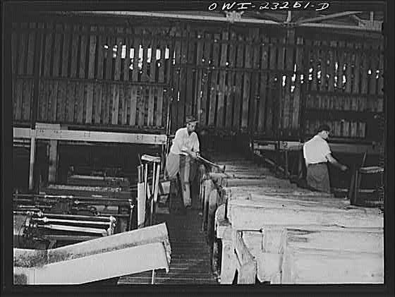 Photo:Lumber Mill Workers 1900s Sawmill Industrial Interior