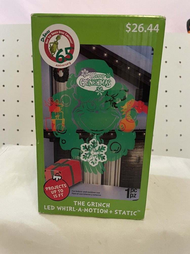 Grinch LED Whirls Motion Projector with 15ft Display New 18.00