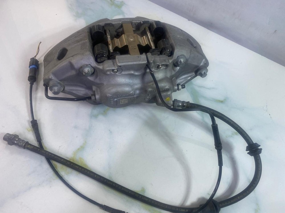 Front Brake Caliper Left, Part Number 8843331 BMW X5 G05 LCI 40I 2024