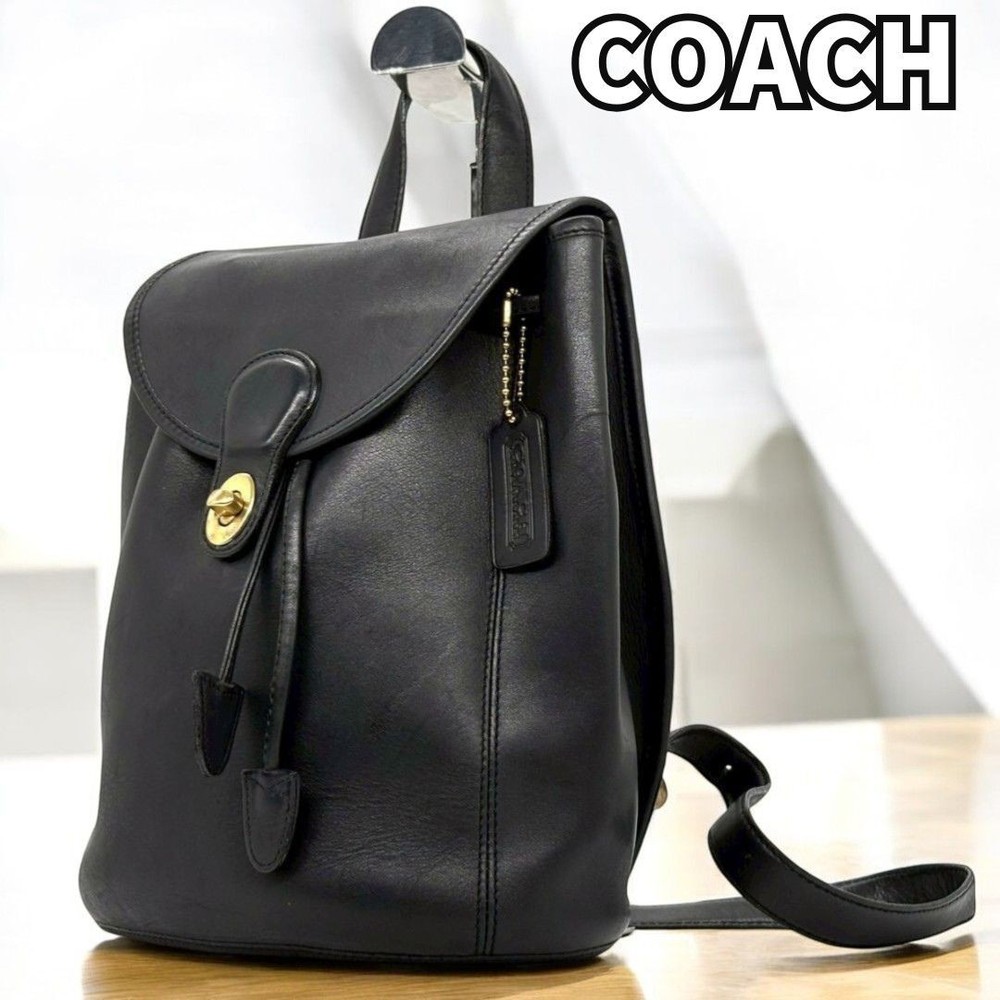 COACH Vintage Leather Backpack with Turn Lock and Drawstring Closure for Travel and Daily Use
