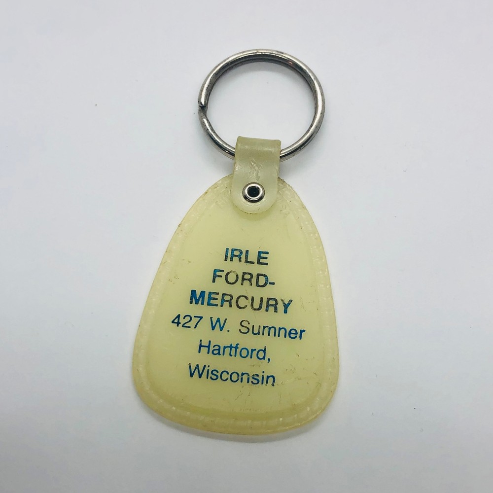 Vtg Irle Ford Mercury Dealer Advertising Glow in the Dark Keychain Hartford WI