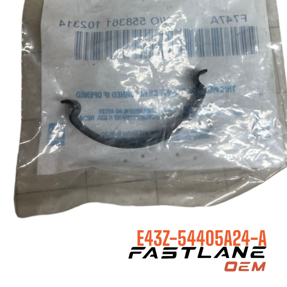 1988-1989 LINCOLN CONTINENTAL FUEL FILLER DOOR SPRING NEW OEM  E43Z-54405A24-A