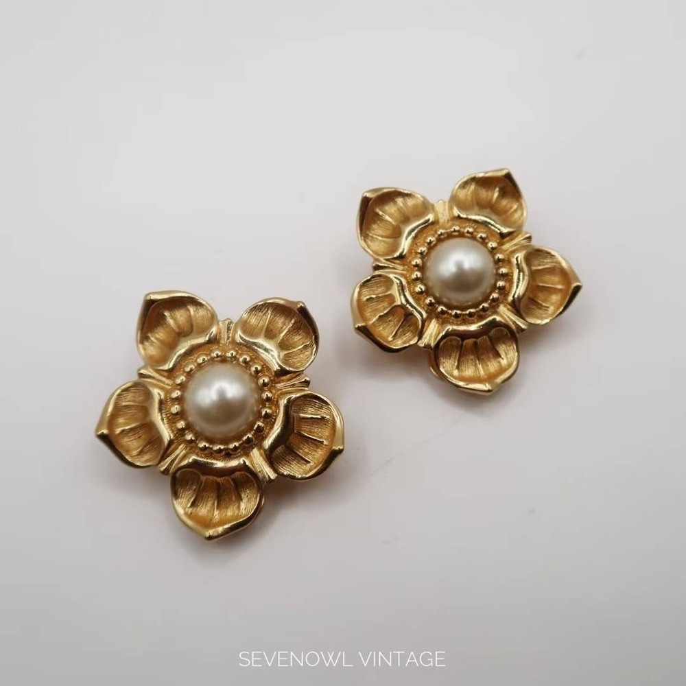 Vintage Christian Dior gold tone floral clip earrings with faux pearls