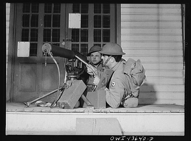 Photo:World War II Soldiers with Machine Gun Position 1940s