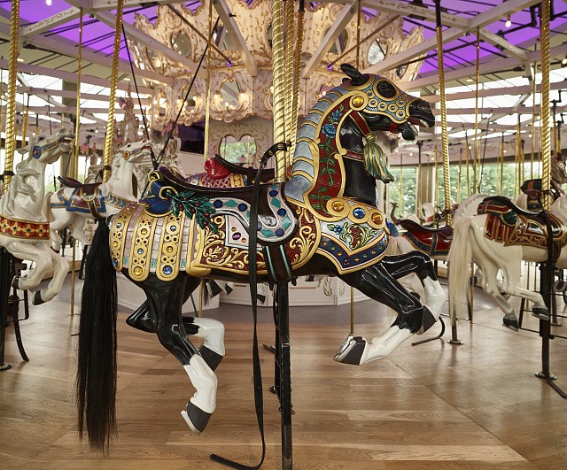 Carved horses in the refurbished Looff Carousel in Spokane, Washington's