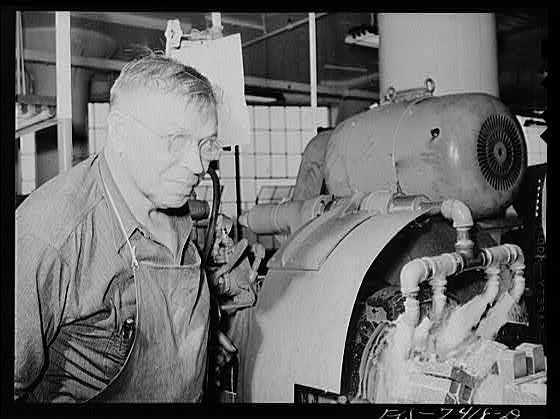 Detroit Michigan 1940s Allison Motors plant lathe operator factory worker