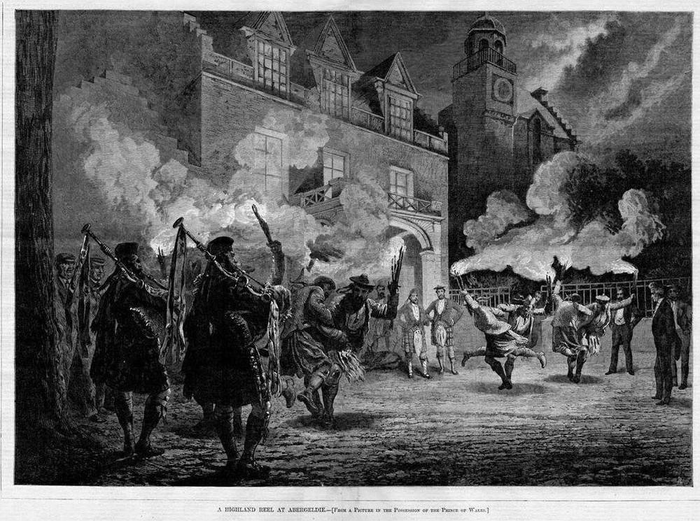 BAGPIPES KILTS HIGHLAND REEL AT ABERGELDIE TORCH FLAMES SCOTLAND HISTORY BAGPIPE