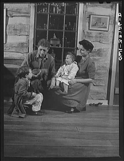Photo:1910s Family with Children on Porch Cabin Interior Portrait