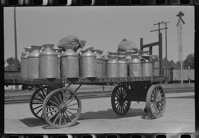Photo:Caldwell Idaho 1941 Milk Cans Arriving by Train Railroad Express