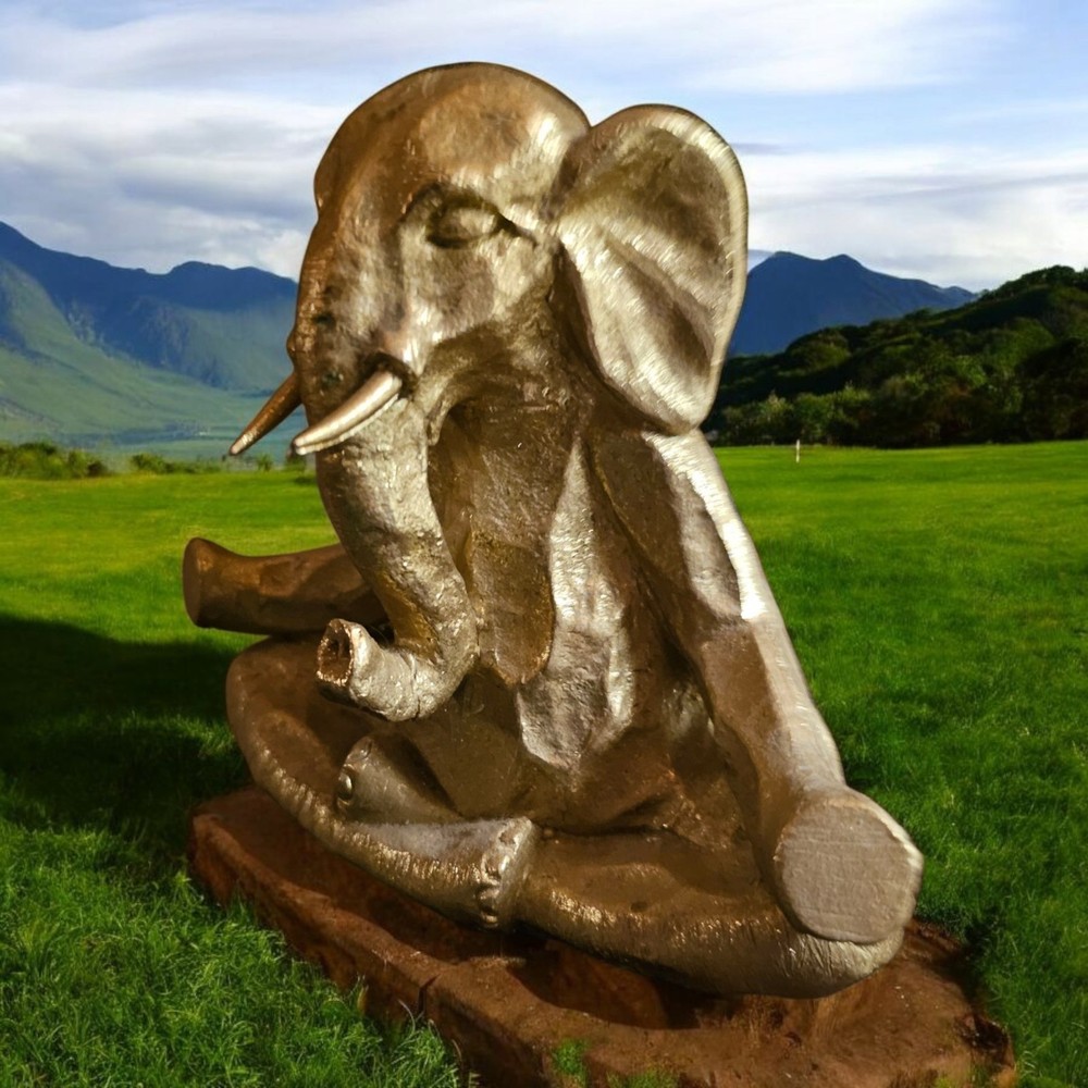 Serene Meditating Buddha with Elephant Statue