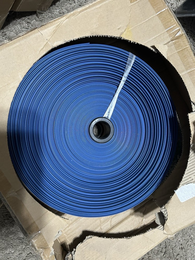 Everbilt 1-1/2 in. I.D. x 150 ft. Polyethylene Econo Flat Discharge Hose