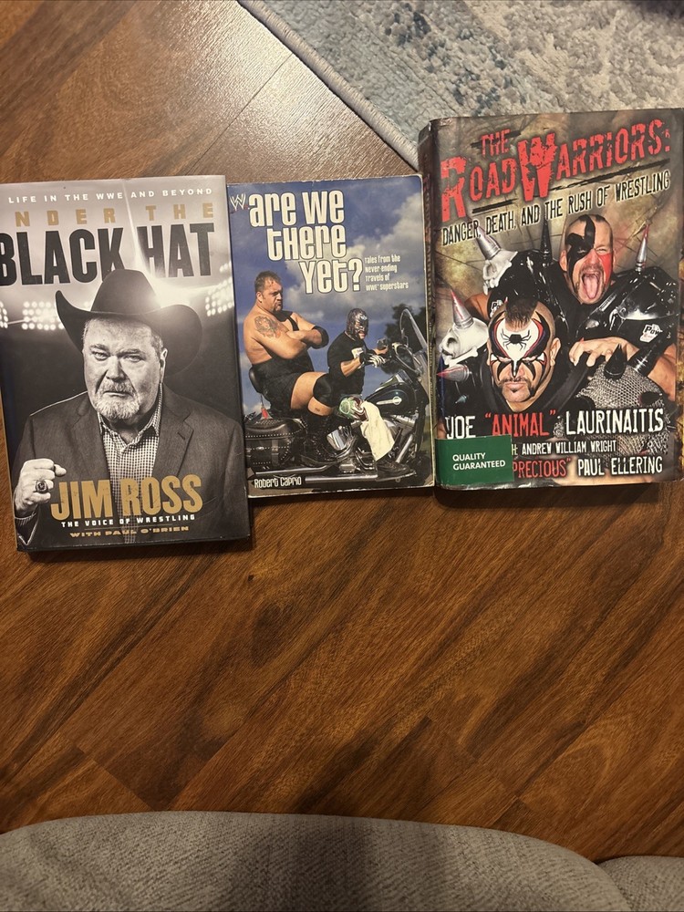 Lot Of 3 WWE Books Jim Ross Under The Black Hat, Road Warriors Biography, WWE